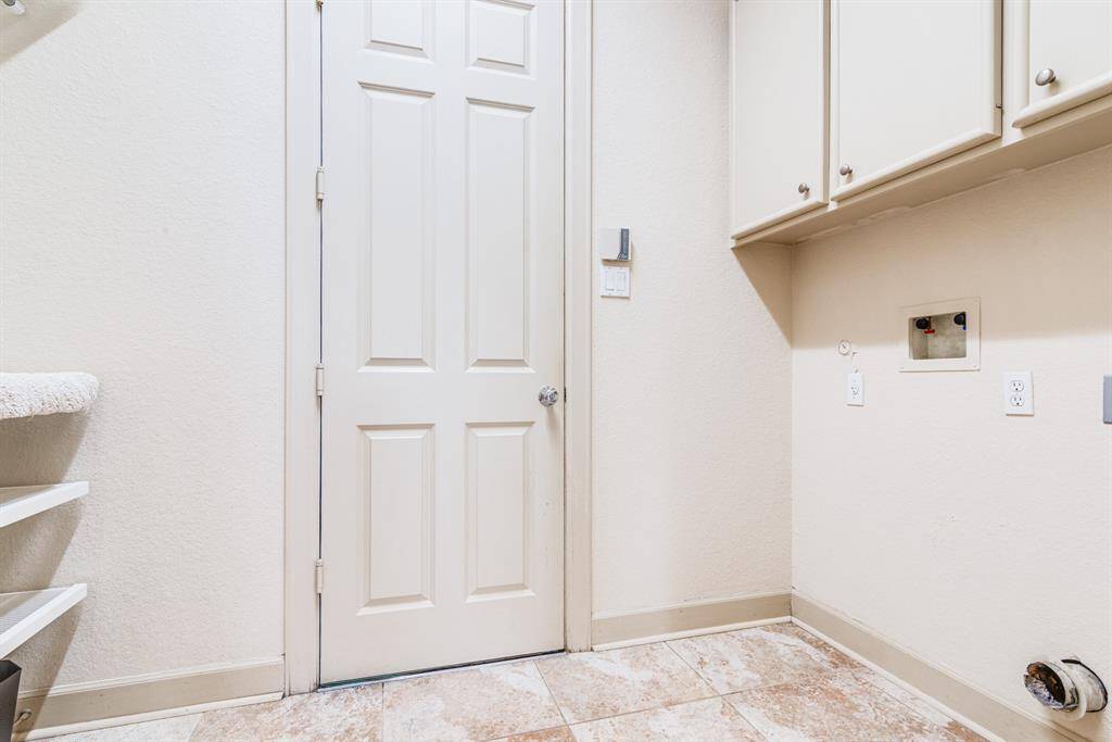 Mud room, laundry area with garage access. Great for bringing shopping and groceries into kitchen. extra storage here for cleaning supplies and bulk items.