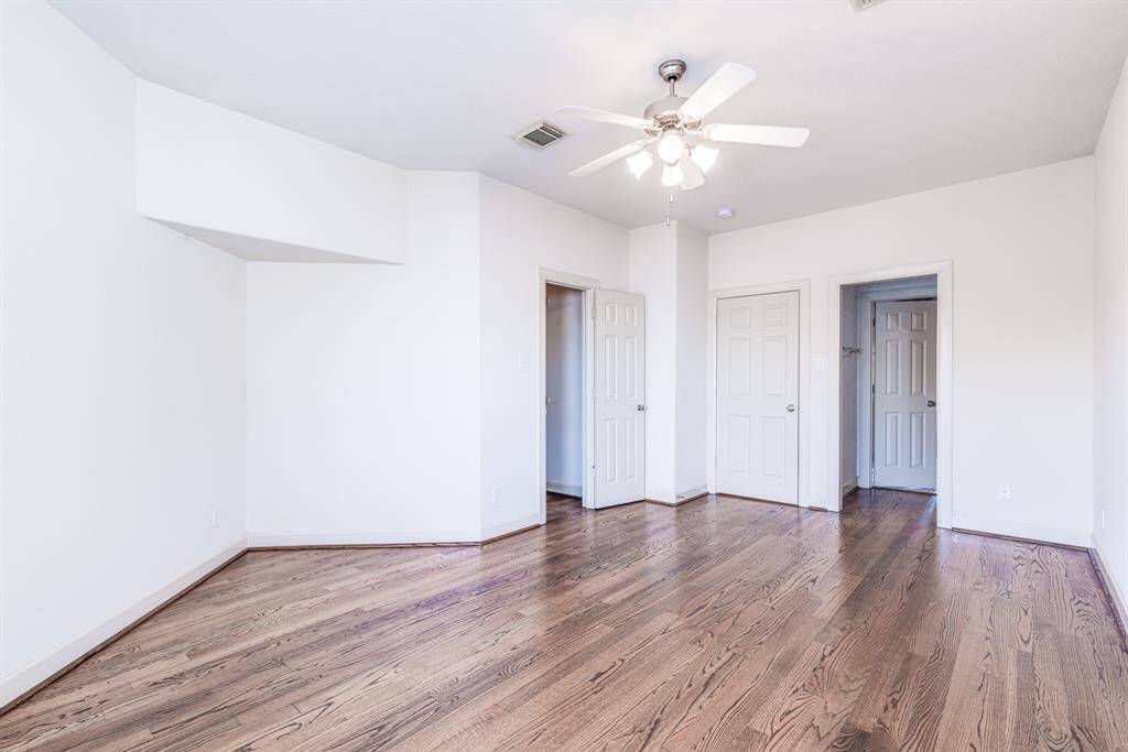 Spacious third bedroom with entry to walk in closet and en suite bathroom.