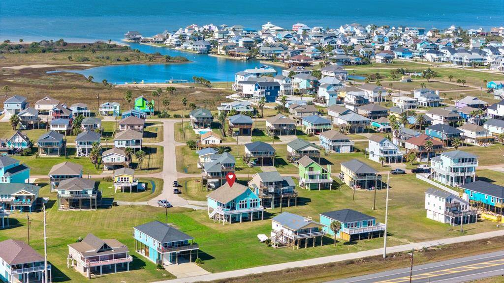 Located just a short walk or golf cart (comes with home!) ride to the beach! Make this dreamy beach house yours today!