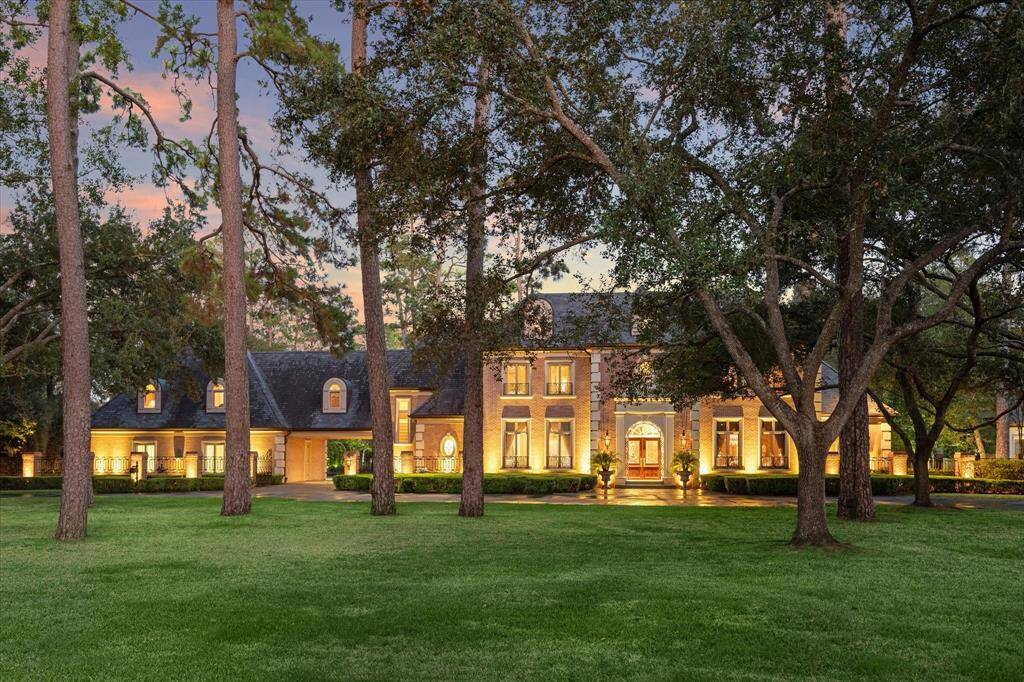 Nestled within the exclusive Timberwilde enclave, this magnificent brick and limestone estate offers the perfect blend of elegance and privacy.