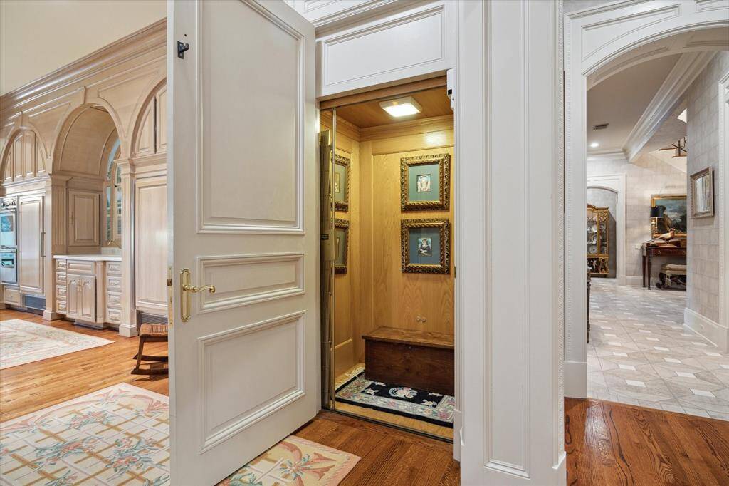 The luxurious primary suite boasts dual bathrooms and ample closet space, ensuring comfort and convenience.