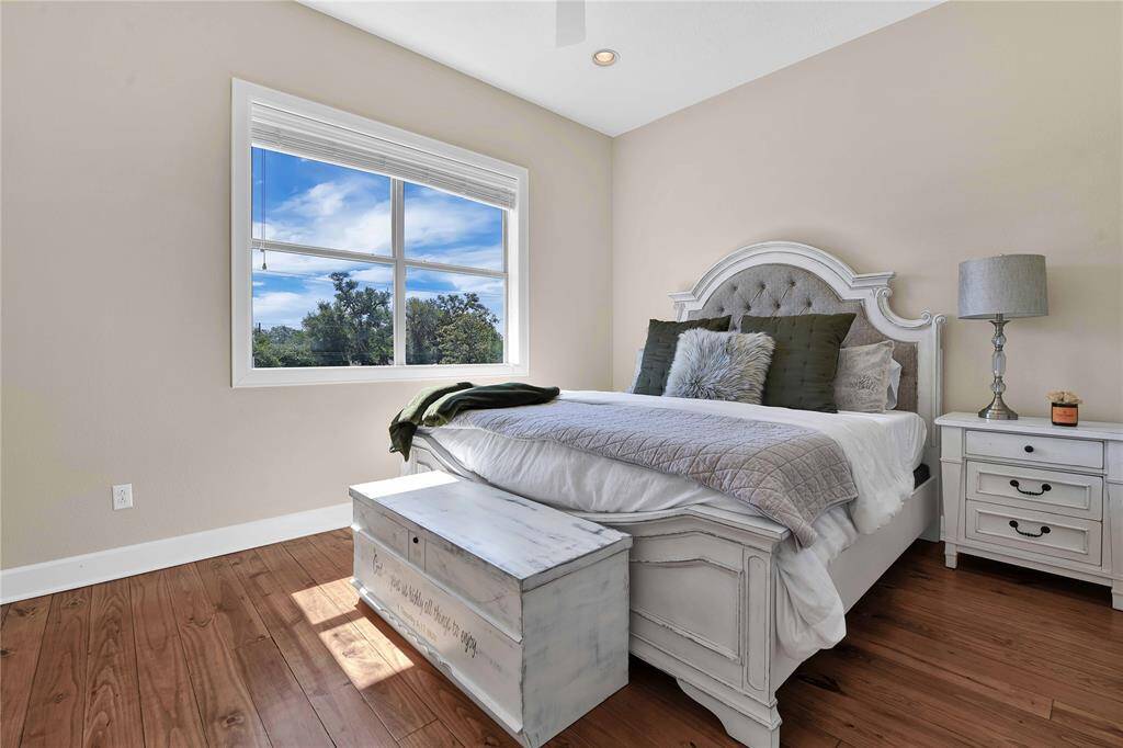 Bedroom #3 shown with a King side bed.