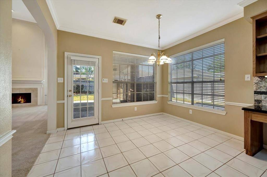 Breakfast area with space for a table with six chairs.
