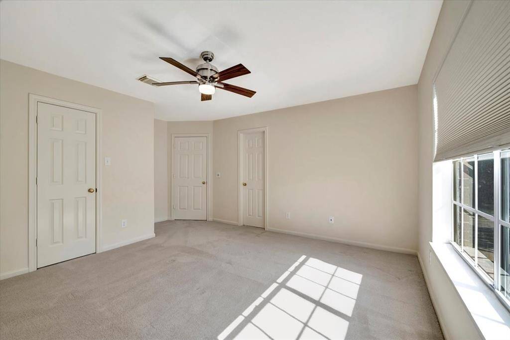 Another view of this bedroom with has a shared Jack and Jill bathroom.
