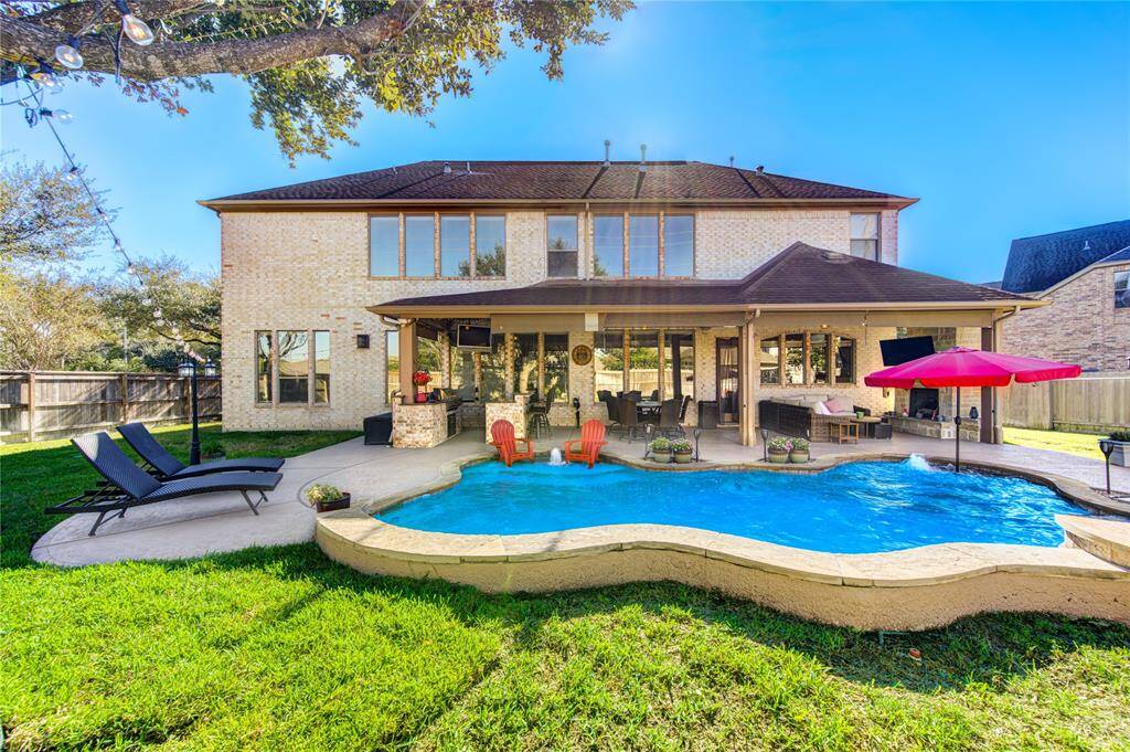 This resort style backyard with TONS of space is waiting for you!