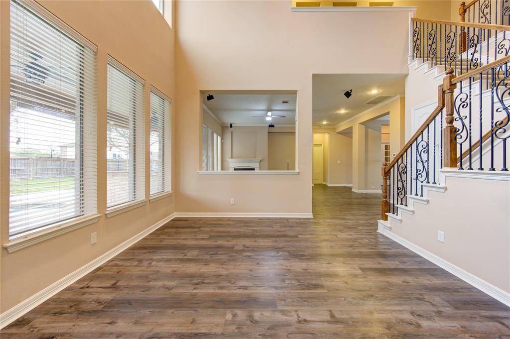 Breakfast room open to the kitchen. TONS of natural light and looks out to the resort style pool area