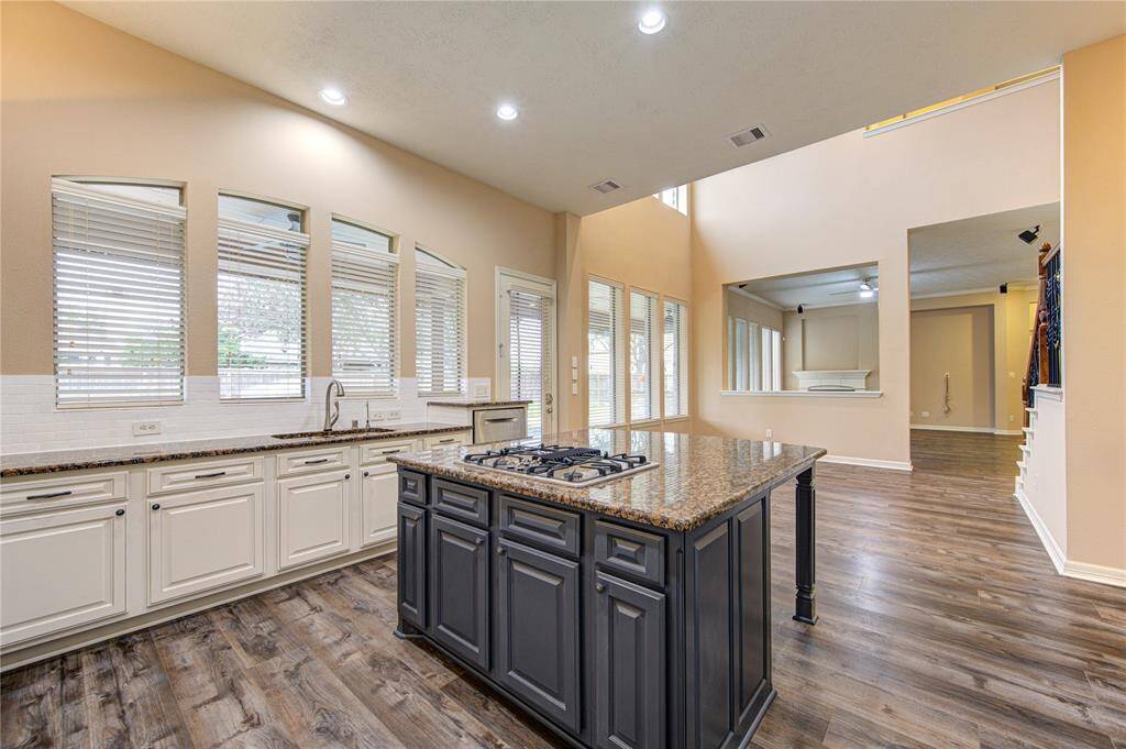 Kitchen is open to the breakfast and living spaces