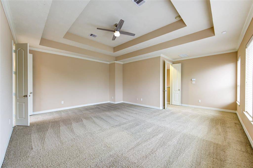 This expansive primary bedroom is the perfect retreat!
