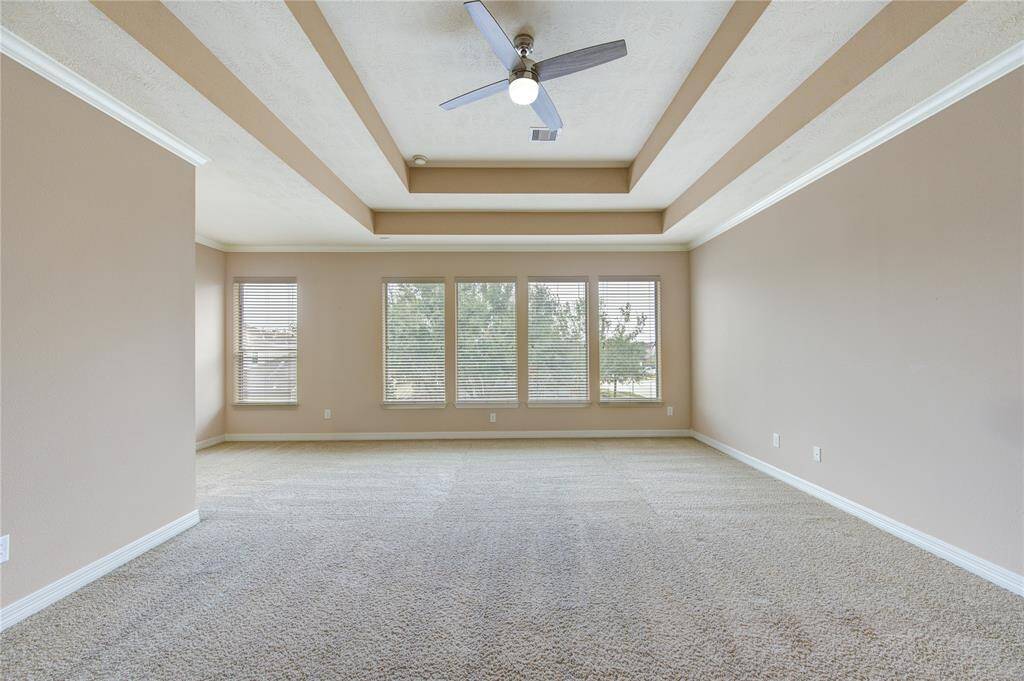 This expansive primary bedroom is the perfect retreat!