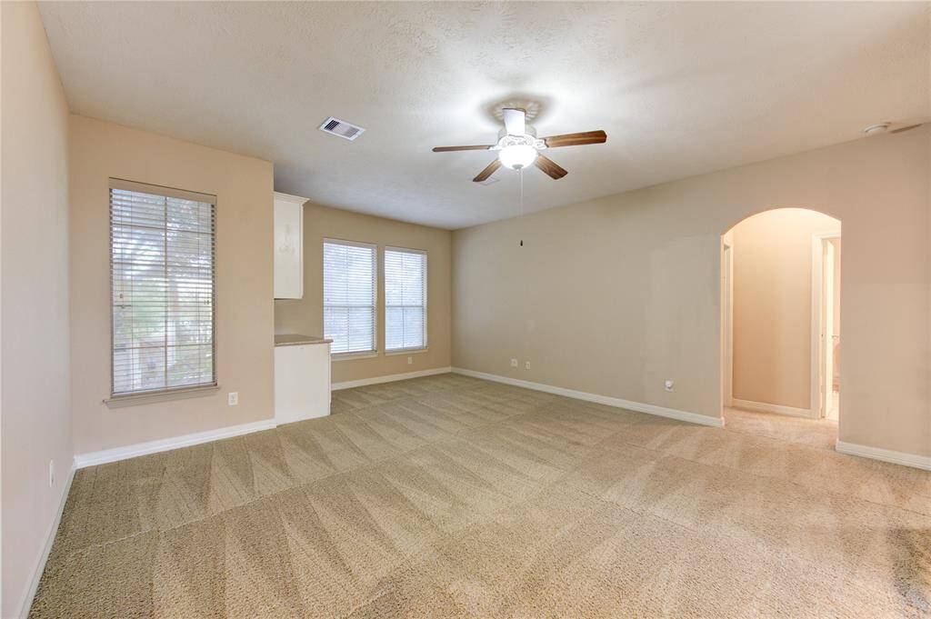 Gameroom with wet bar.