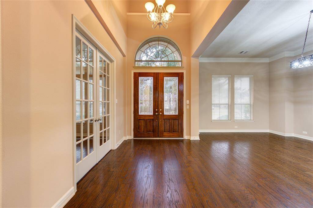 Beautiful entry with enclosed office and formal dining area