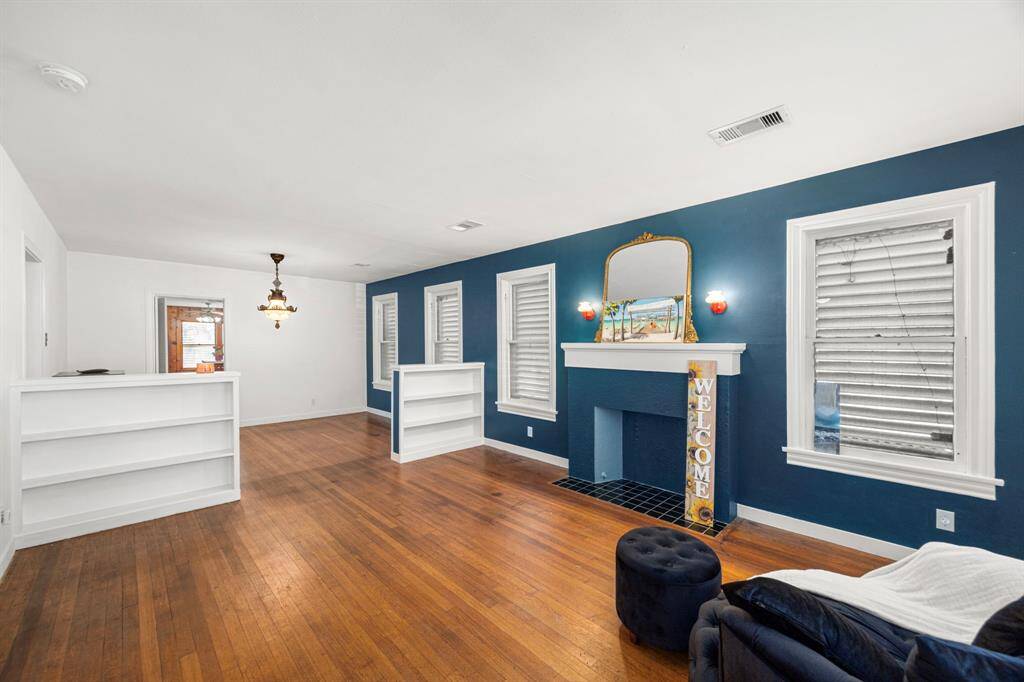 Spacious living room opens to the dining area.