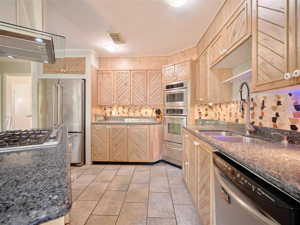 Spacious granite countertops perfect for culinary enthusiasts.