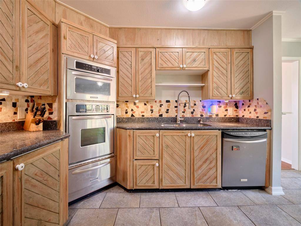 Discover the heart of your new home in this beautifully crafted kitchen, complete with modern appliances and elegant finishes.