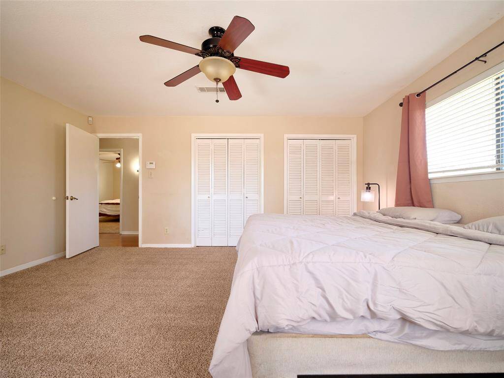 Enjoy ample storage with dual closets in the spacious primary suite.