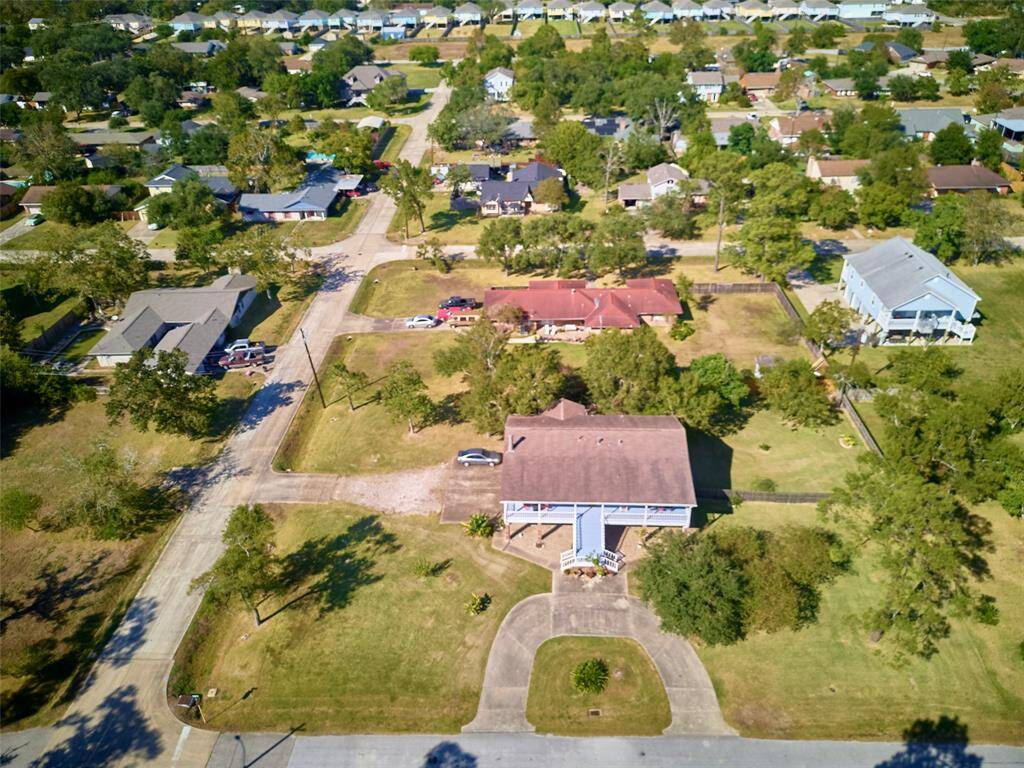Experience the allure of refined living in this graceful Shoreacres home.