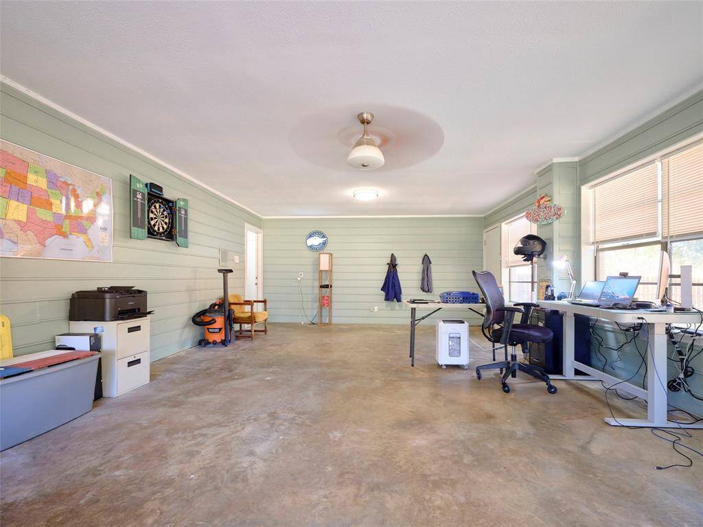 Discover the versatility of this luminous sunroom, complete with a dedicated mini-split AC unit for year-round comfort. Ideal as a spacious home office or your personalized retreat, this space adapts seamlessly to your lifestyle needs.