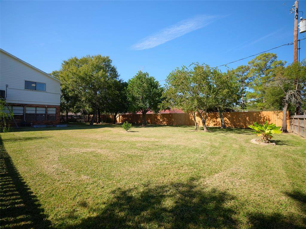 Spacious backyard with ample room for a dream pool.