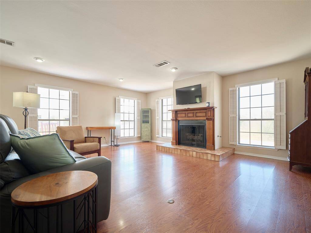 Flooded with sunlight, this inviting space offers a bright and airy ambiance.