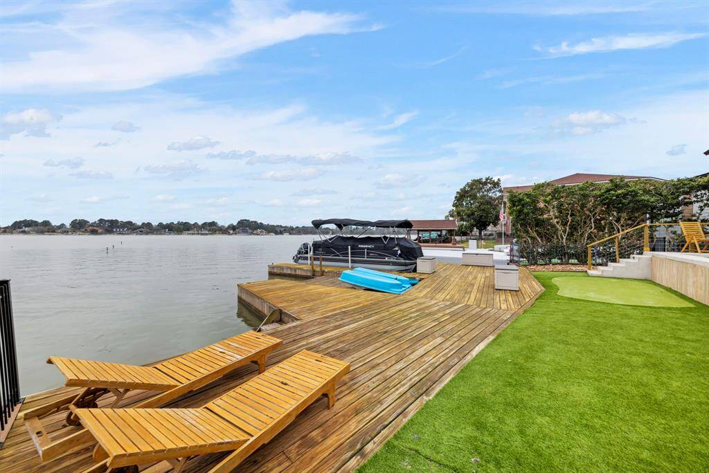 Expansive deck perfect for outdoor relaxation, entertaining, and soaking in the breathtaking lake views.