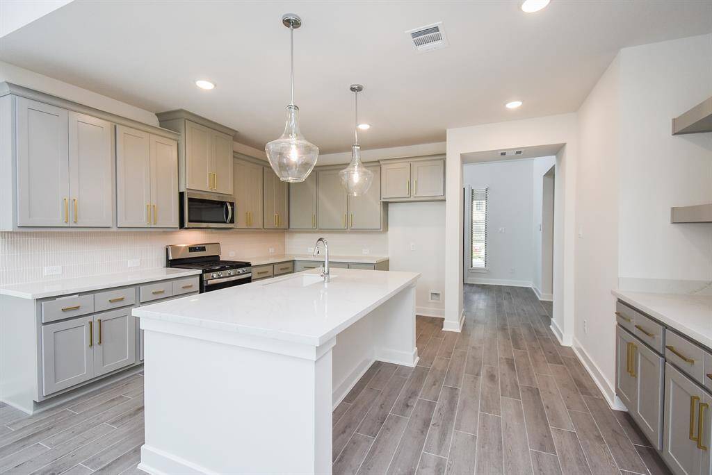 Modern kitchen design with top-of-the-line appliances.