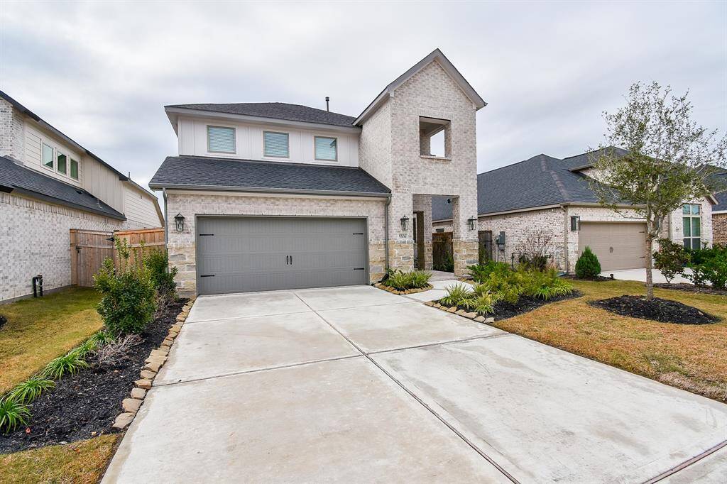 Contemporary exterior design with well-maintained landscaping.