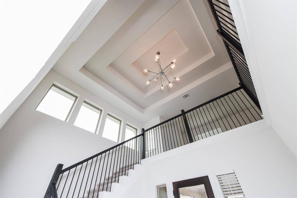 Beautiful coffered ceiling adding character to the living area.