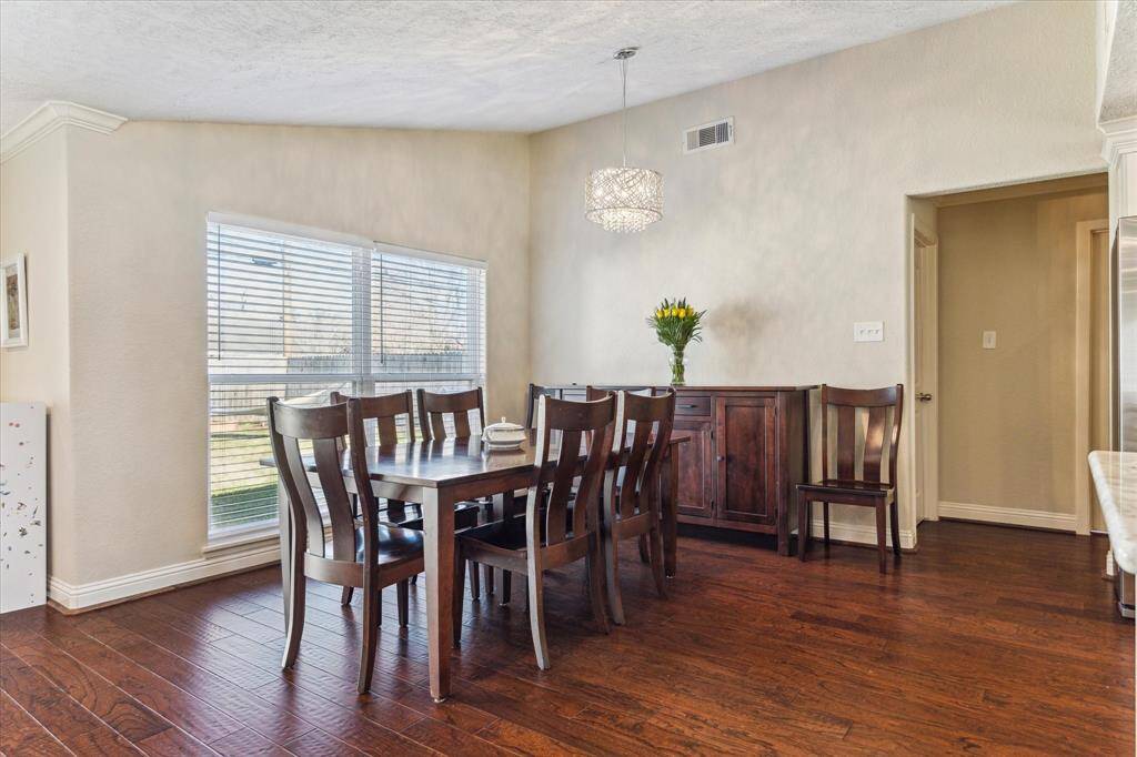A dining room for the casual nightly dinners to large family gatherings. It provides ample room for seating, making it the perfect for everything from family meals to lively game nights.