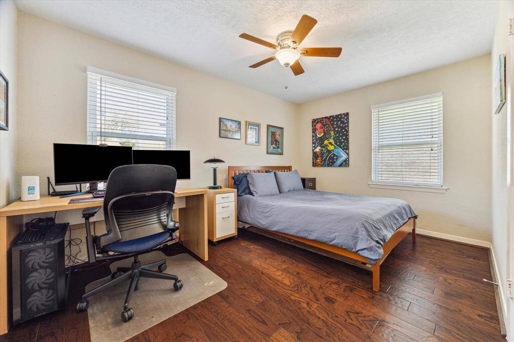 The back third bedroom offers versatility, making it an ideal guest retreat, a productive home office, or a combination of both. This flexible space adapts to suit your lifestyle needs.