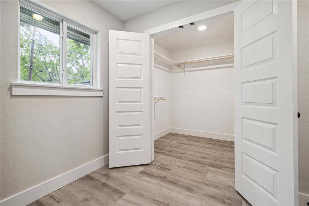 Huge walk in closet in master bedroom