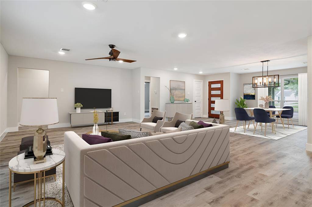 5466 Beechnut beautifully renovated home in great location. Virtually staged open living, dining. Open living dining, virtually staged
