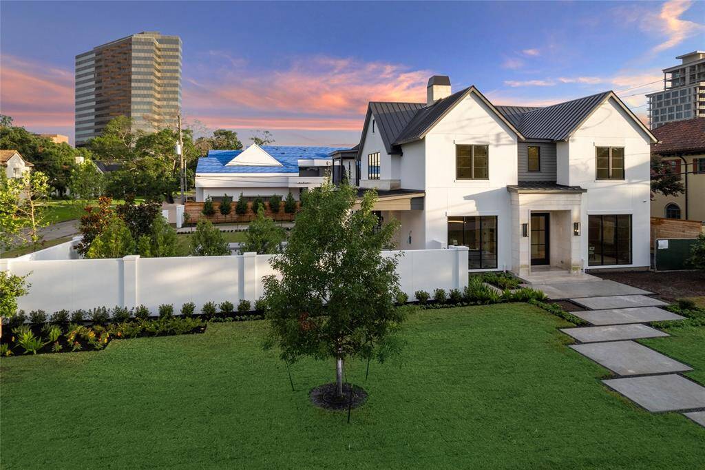 Recently completed in the heart of Tanglewood, this custom home built by Allan Edwards is situated on an oversized 23,220 square foot lot.