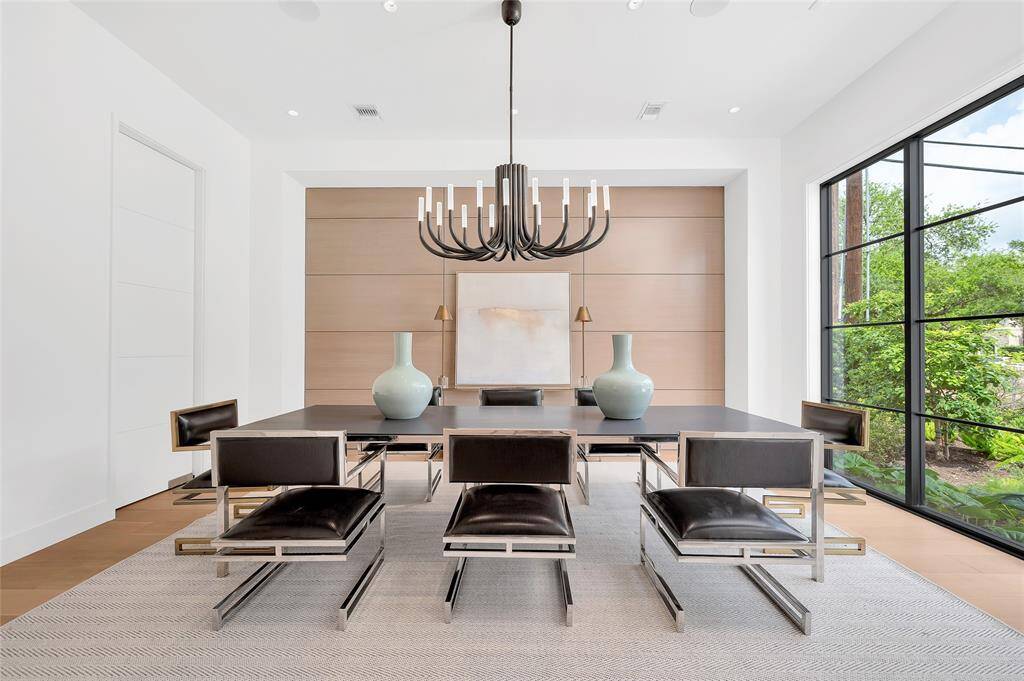 The kitchen comes complete with Wolf stainless appliances, Wolf gas range with 6 burners & griddle, 3 ovens, 2 dishwashers, built in SubZero refrigerator and freezer and12 foot ceilings.