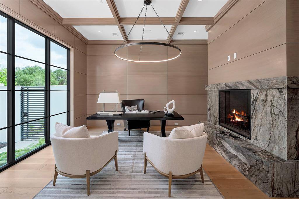 You will note an abundance of flush cabinets and drawers all with soft close, a catering kitchen, walk-in pantry dramatic globe light fixtures, honed finished Quartzite and a huge island with kitchen bar seating.