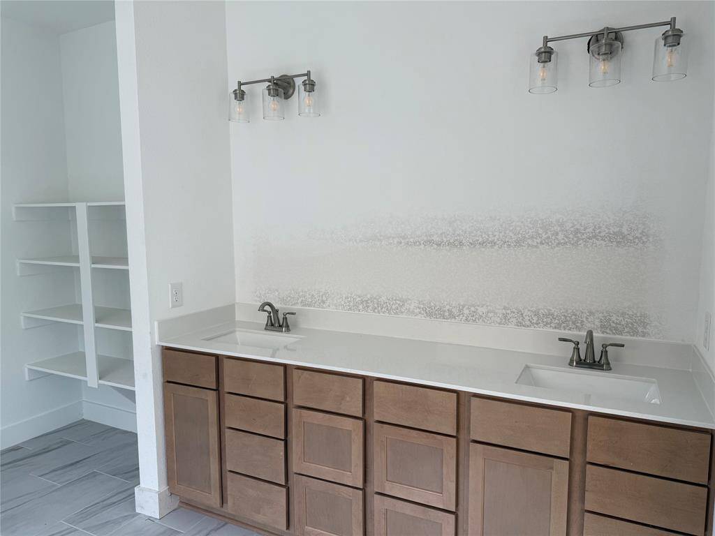 With thoughtful storage solutions tucked away, everything you need is at your fingertips