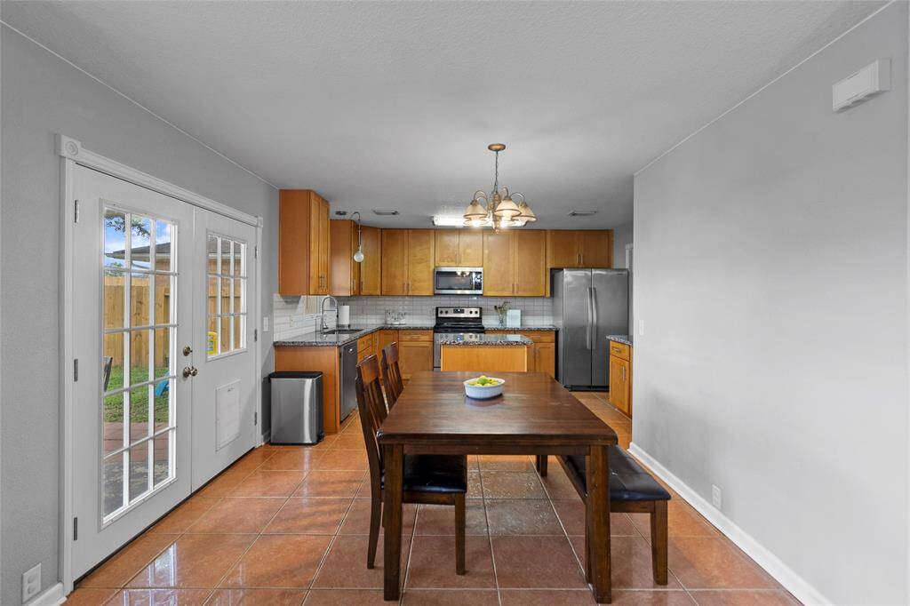 Your dining room is a warm and inviting space, perfect for sharing meals and making memories. Its open layout fosters a welcoming ambiance, creating an ideal setting for gatherings with family and friends.