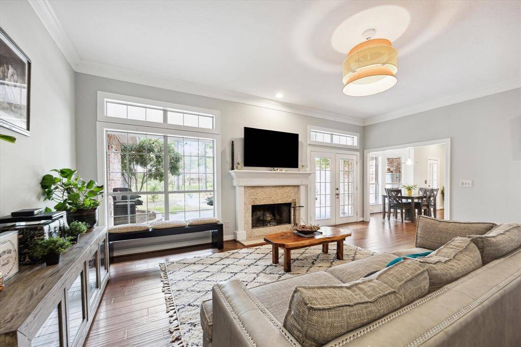 The natural flow between the adjoining kitchen and living room offers functionality