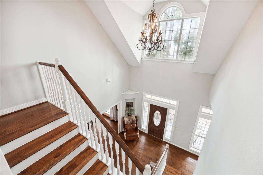 Natural light and wooden floors continue throughout the home