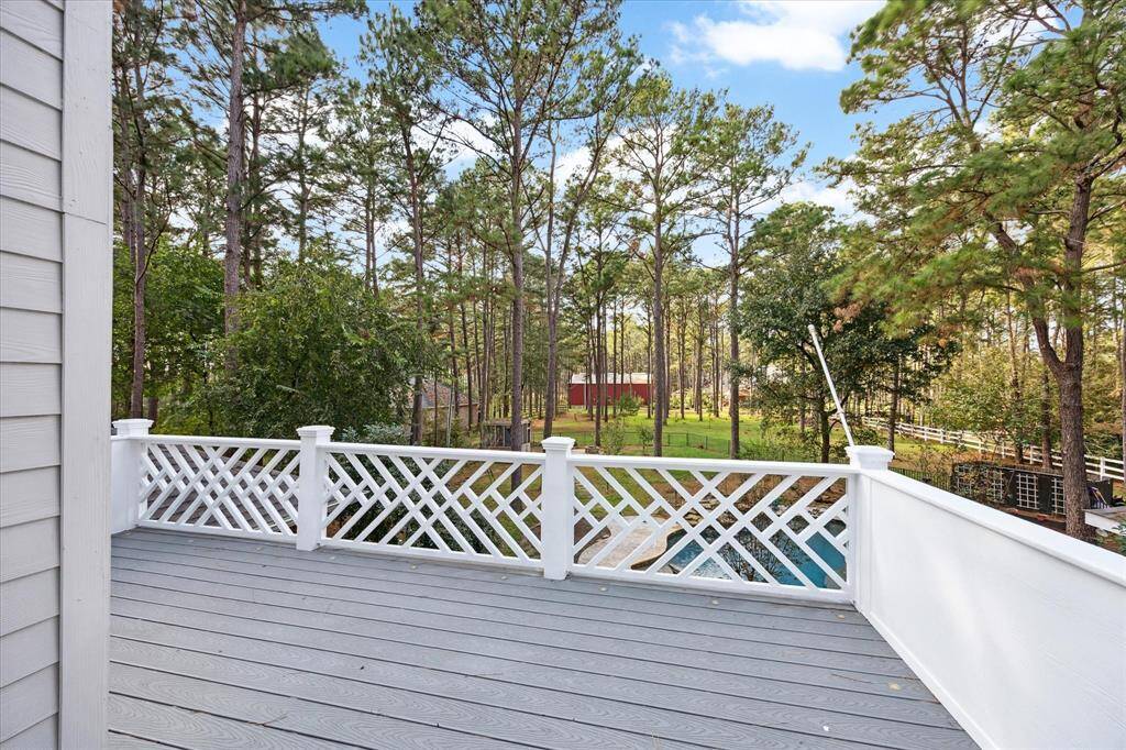 Step onto the second floor balcony where peaceful views await