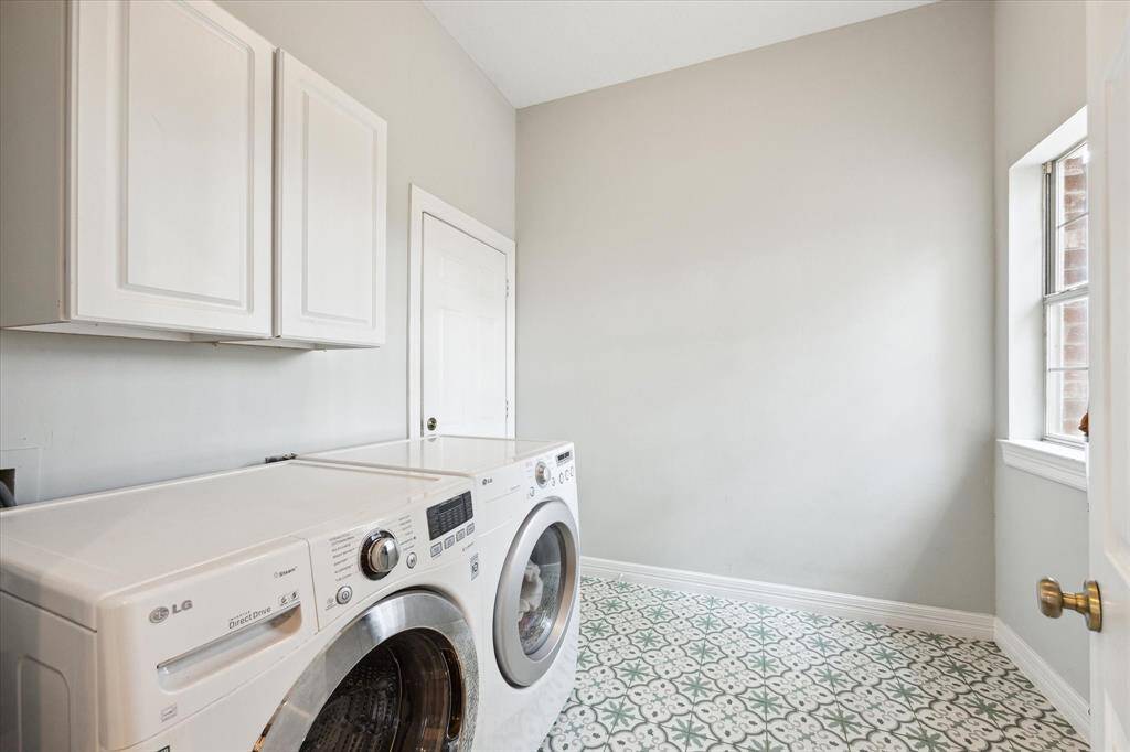Step inside the utility room just off the kitchen, you will find updated flooring and natural light surrounding the room