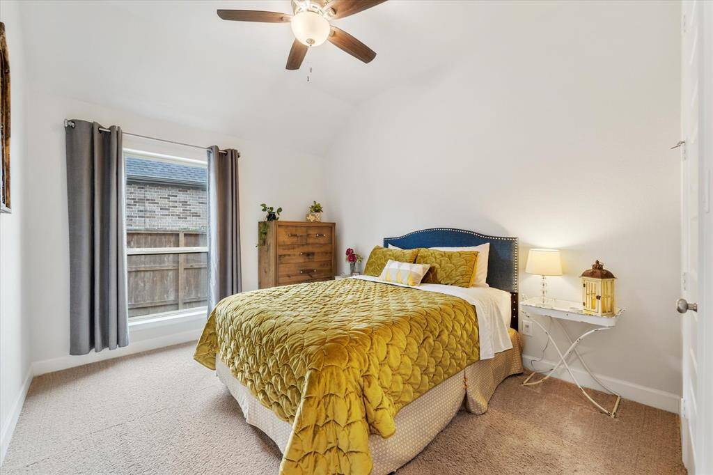 The secondary full bathroom includes a shower/tub combo and offers ample vanity space for added convenience.