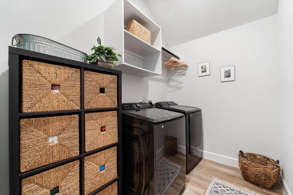 Welcome home to your spacious covered patio, complete with a ceiling fan & recessed lights, making it the ideal spot for entertaining family and guests. String lights, Lion grill & cooktop are included!