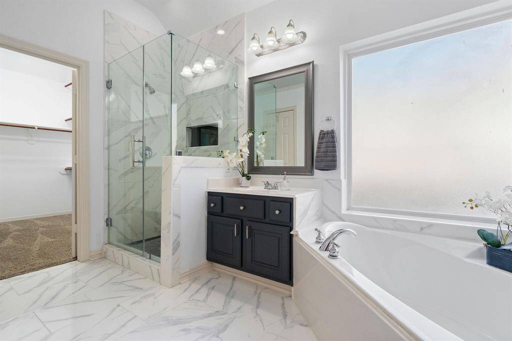 Elegant Ground-Level Ensuite with Marble Accents