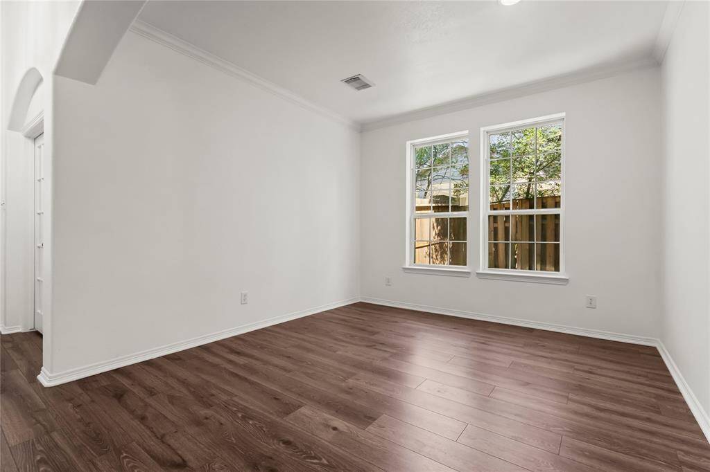 Ground-level formal living room, perfect for a cozy sitting area.