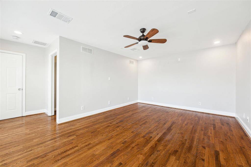 Primary Bedroom with large walk-in closet to the Left.