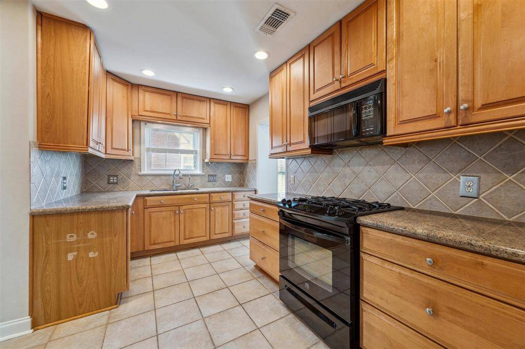 A half bathroom sits just to the left of the kitchen on the first floor.