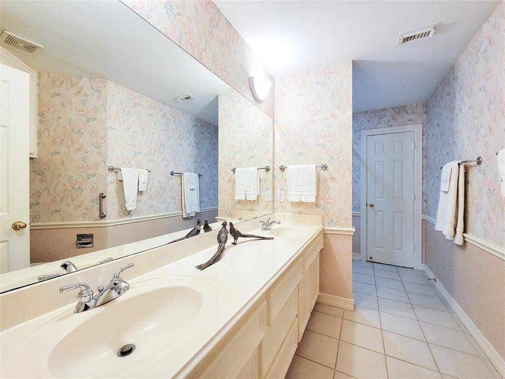 another view of Pass-through Hall Bath with tub/shower combo with new white tile