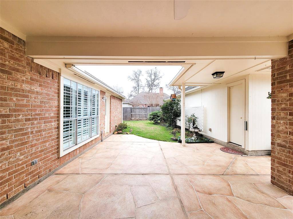 another view of Patio & Backyard, side garage entry
