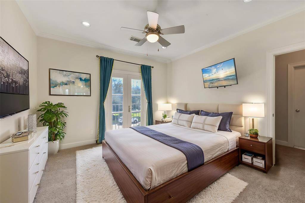 SPACIOUS SECONDARY BEDROOM WITH BALCONY ACCESS. **This room has been virtually staged.