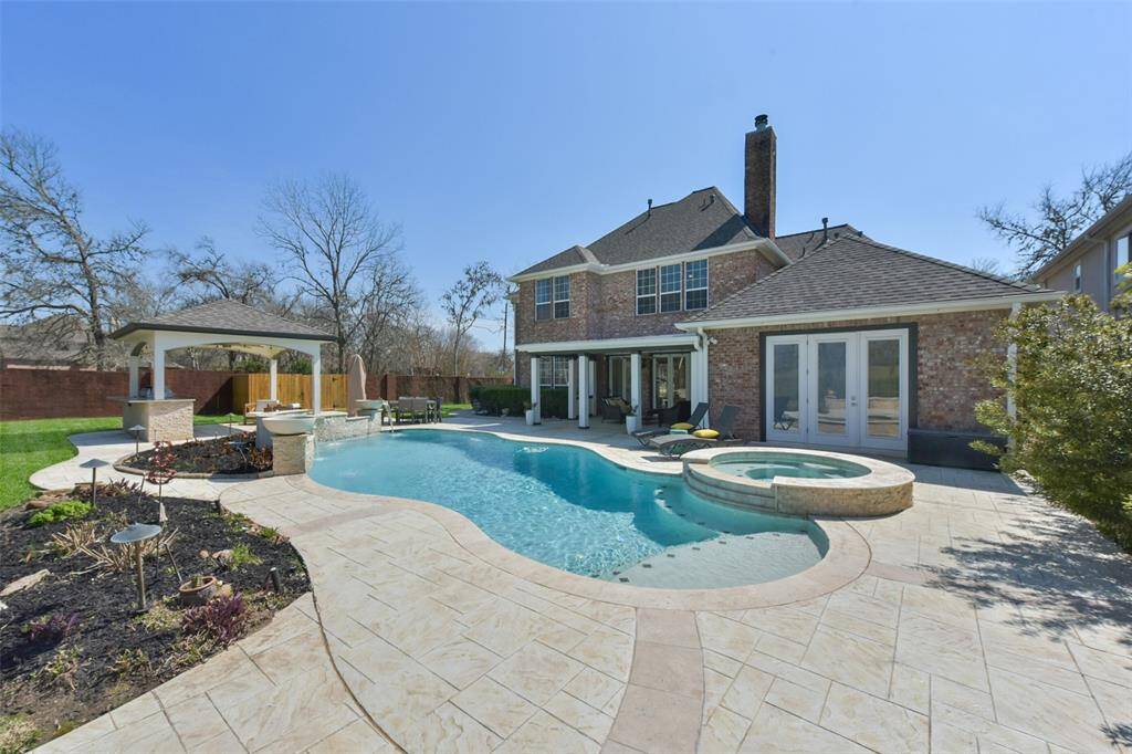 LARGE, WELL-MAINTAINED BACKYARD WITH LUSH GREEN SPACE, MAKING THIS HOME AN ENTERTAINERS DREAM.